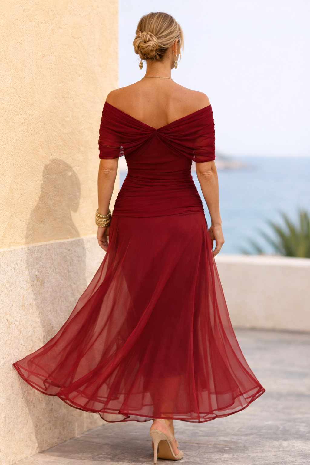 Adriana | Vestido maxi fluido con escote cruzado off-shoulder